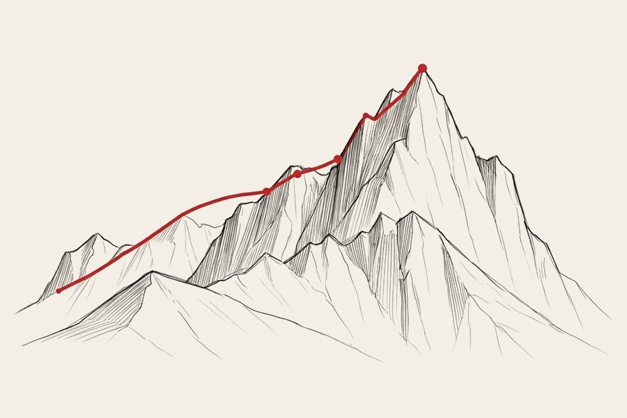 A mountain range with a red route climbing to the summit
