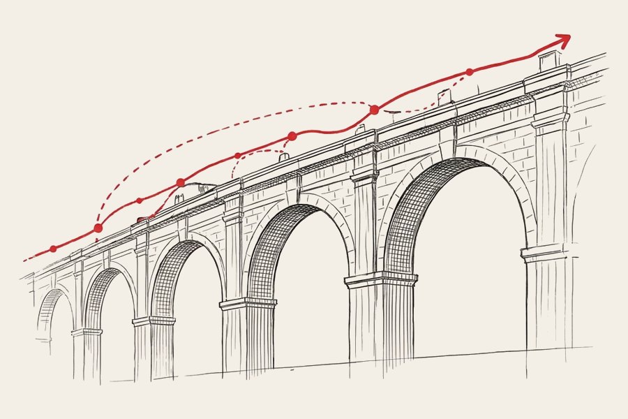 A Roman aqueduct with a red line rising steadily above it